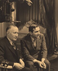 Two men, Adolph Zukor and Ernst Lubitsch, looking off camera to the right