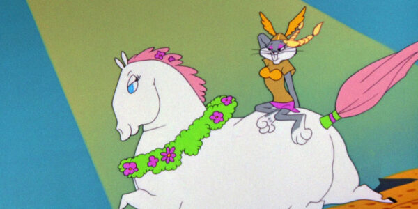 Bugs bunny wearing pigtails and a bra riding a white horse.