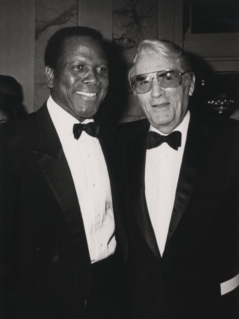 Sidney Poitier and Gregory Peck at MoMI's black-tie Salute to Poitier (February 28, 1989).