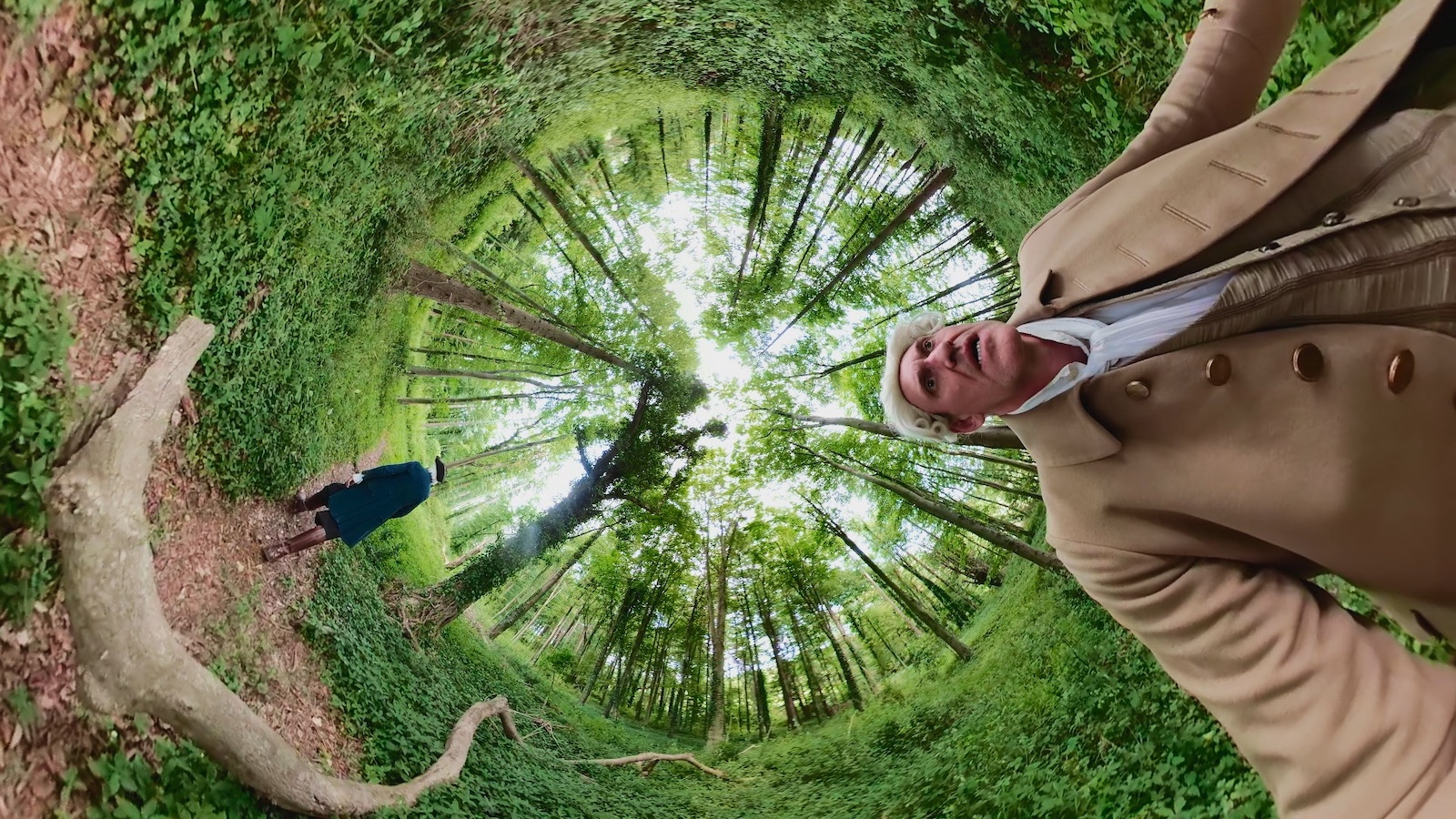A fantasy spiral effect of an outdoor scene of two men in a green forest