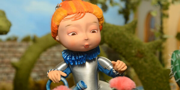 A computer generated animated character with orange hair and wearing armor waters pink flowers