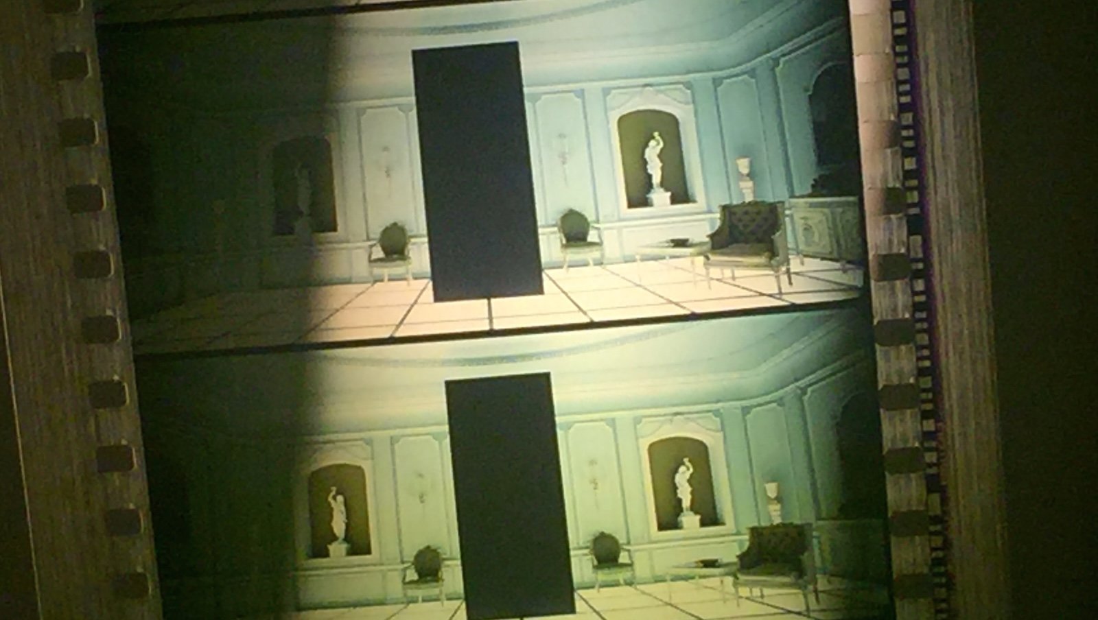 Two frames from the film 2001: A Space Odyssey showing the film projector sprockets on the side. The image is of a large black rectangle monolith standing straight in a white, ornate room with a glowing floor and statuaries on the walls.
